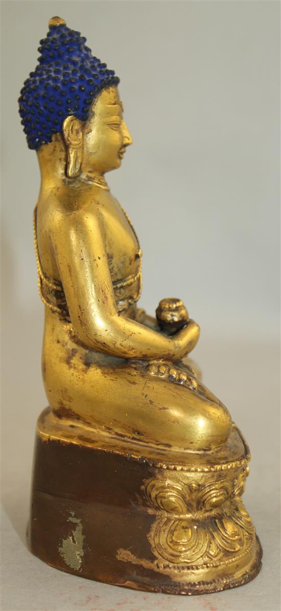 A Sino-Tibetan gilt bronze figure of Sakyamuni Buddha, 15.5cm